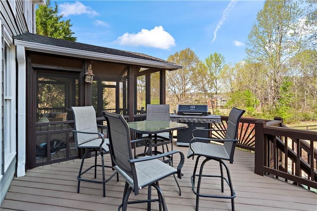 410 Hickory Fairway Ct, Woodstock, GA 30188 - wooden deck with grilling area, outdoor dining space, and a sunroom
