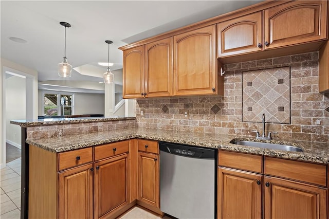 410 Hickory Fairway Ct, Woodstock, GA 30188 - kitchen featuring dishwasher, a sink, a peninsula, stone countertops, and brown cabinets