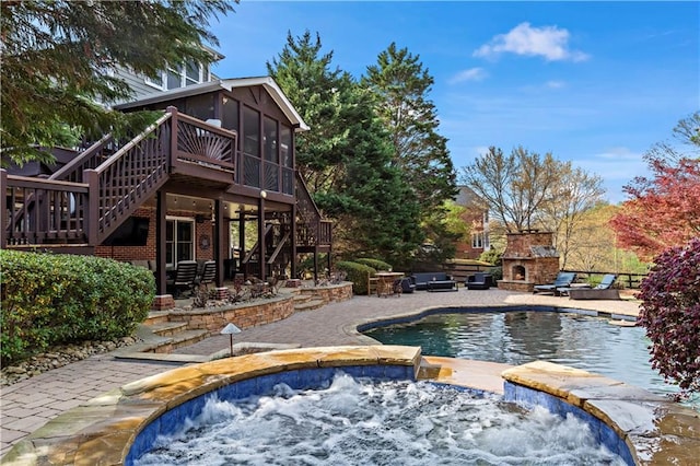 410 Hickory Fairway Ct, Woodstock, GA 30188 - outdoor pool featuring stairs, a sunroom, an outdoor stone fireplace, an in-ground hot tub, and a patio area