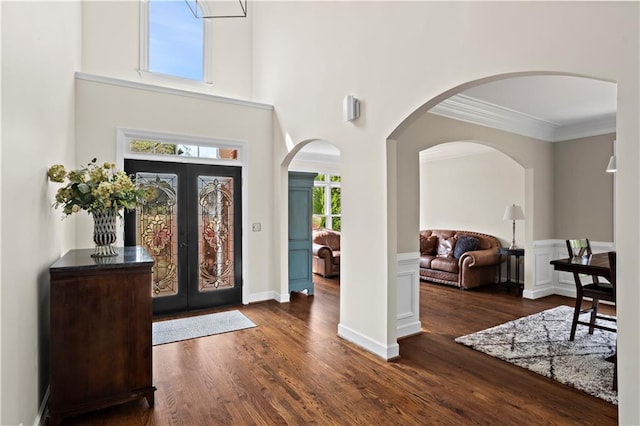 410 Hickory Fairway Ct, Woodstock, GA 30188 - foyer with wood finished floors, crown molding, french doors, and arched walkways