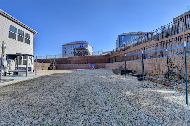 view of yard with a patio and a fenced backyard