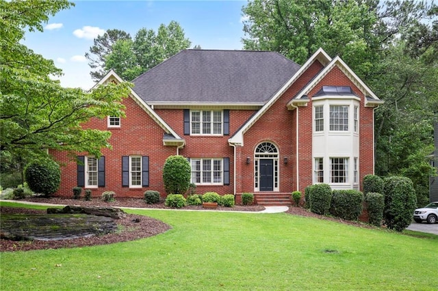 963 Bolingbrook Dr SW, Marietta, GA 30064 - view of front of property with a front yard and brick siding