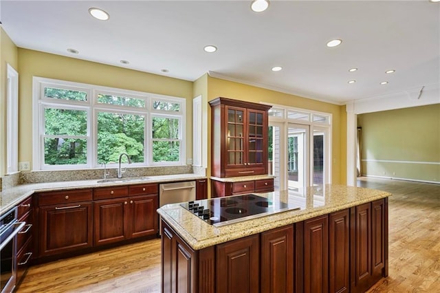 963 Bolingbrook Dr SW, Marietta, GA 30064 - kitchen featuring stainless steel appliances, a sink, healthy amount of natural light, a kitchen island, and recessed lighting