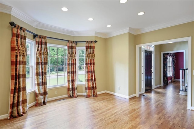 963 Bolingbrook Dr SW, Marietta, GA 30064 - spare room with healthy amount of natural light, ornamental molding, wood finished floors, recessed lighting, and baseboards