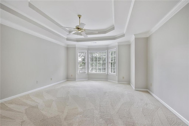 963 Bolingbrook Dr SW, Marietta, GA 30064 - carpeted spare room featuring ceiling fan, a raised ceiling, ornamental molding, and baseboards