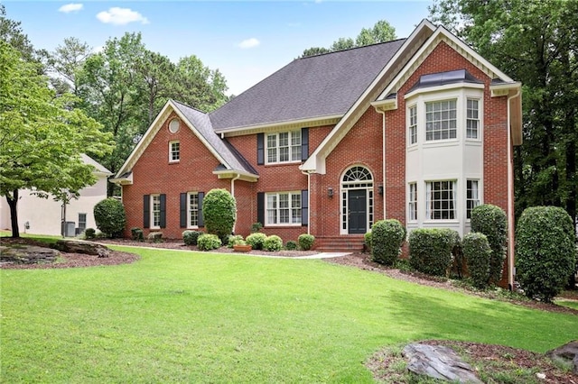 963 Bolingbrook Dr SW, Marietta, GA 30064 - view of front of property with brick siding and a front yard