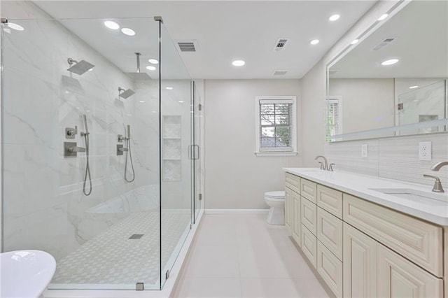 963 Bolingbrook Dr SW, Marietta, GA 30064 - bathroom featuring a marble finish shower, toilet, double vanity, baseboards, and recessed lighting