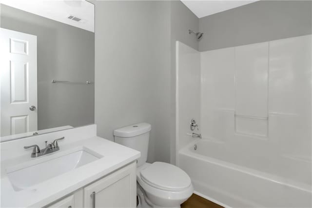 1011 Riverclift Dr, Covington, GA 30016 - full bathroom with toilet, vanity, and shower / bath combination