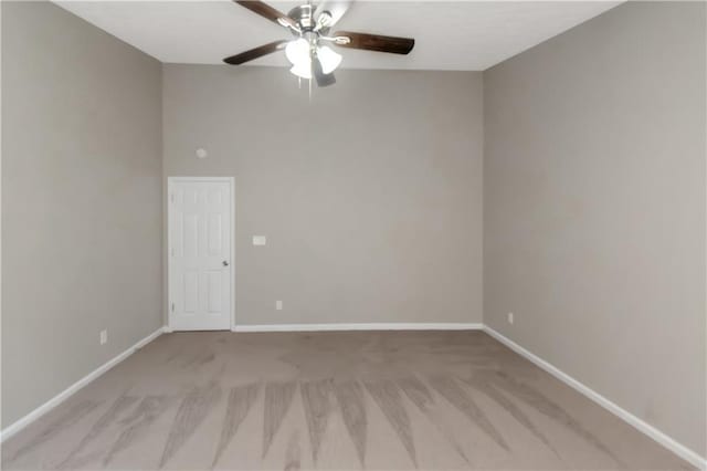 1011 Riverclift Dr, Covington, GA 30016 - empty room with ceiling fan, light colored carpet, and baseboards