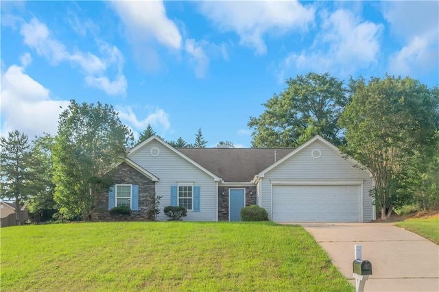 1011 Riverclift Dr, Covington, GA 30016 - single story home featuring a garage, driveway, a front yard, and stone siding