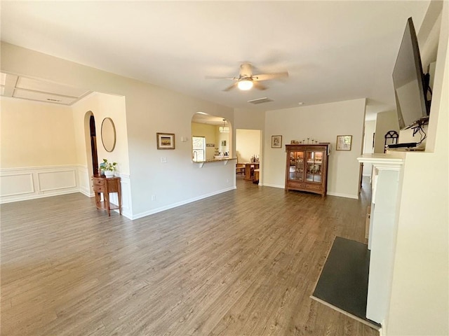 57 Matador, Newnan, GA 30263 - living area with arched walkways, ceiling fan, and wood finished floors