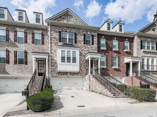 townhome / multi-family property featuring a garage