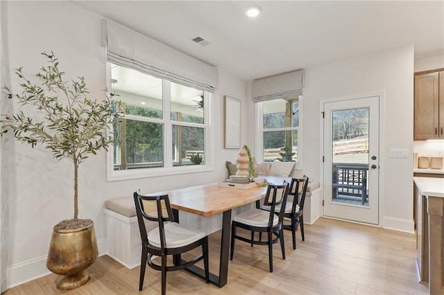 dining area featuring light hardwood / wood-style floors and breakfast area