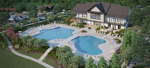 view of swimming pool featuring a patio area