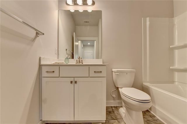 bathroom with bathtub / shower combination, toilet, visible vents, vanity, and baseboards