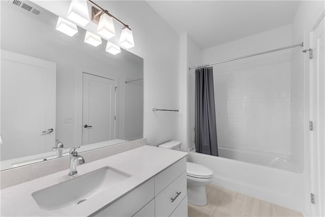 full bathroom with tile patterned flooring, toilet, vanity, and shower / tub combo with curtain