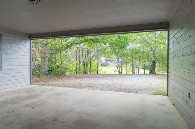 garage featuring an attached carport