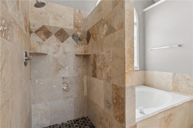 full bath featuring a tile shower, a wealth of natural light, and a garden tub