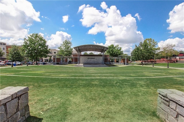 view of home's community with a lawn