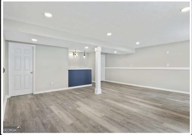2106 Singer Way, Lithonia, GA 30058 - finished basement featuring wood finished floors and recessed lighting