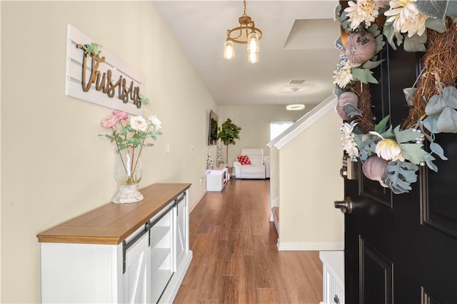 hall featuring hardwood / wood-style floors