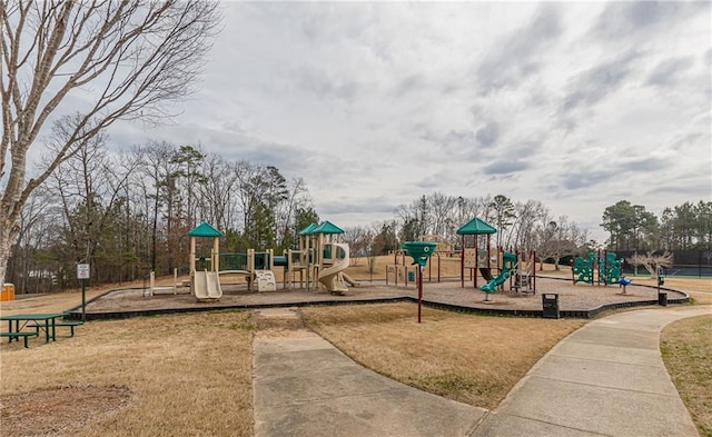 view of jungle gym with a lawn