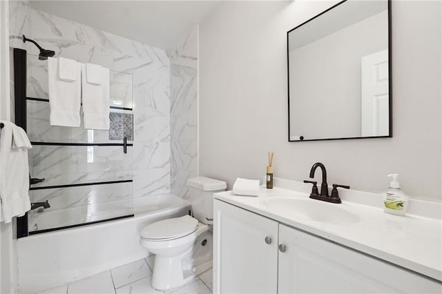 912 Ira St SW, Atlanta, GA 30310 - bathroom with marble look tile flooring, vanity, toilet, and washtub / shower combination