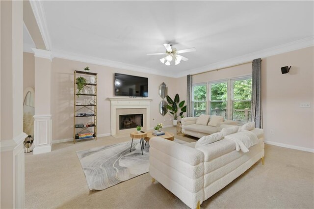 living room featuring light carpet, crown molding, and ceiling fan