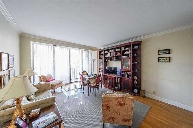 office space with crown molding and hardwood / wood-style floors