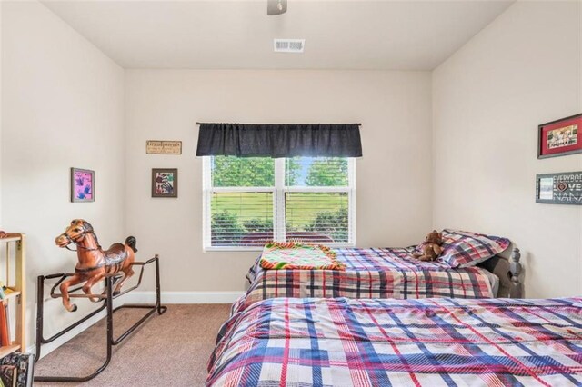 210 Riverpoint Way, Jackson, GA 30233 - carpeted bedroom with baseboards and ceiling fan