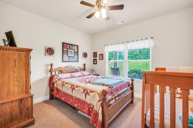 210 Riverpoint Way, Jackson, GA 30233 - bedroom featuring light carpet, baseboards, and a ceiling fan