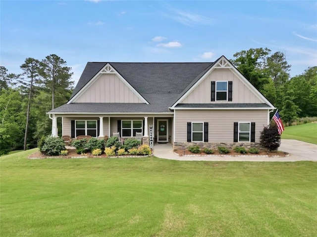 210 Riverpoint Way, Jackson, GA 30233 - craftsman inspired home featuring board and batten siding, a front yard, and a porch