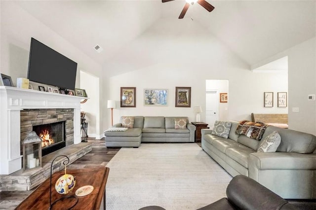 210 Riverpoint Way, Jackson, GA 30233 - living area with ceiling fan, lofted ceiling, wood finished floors, and a fireplace