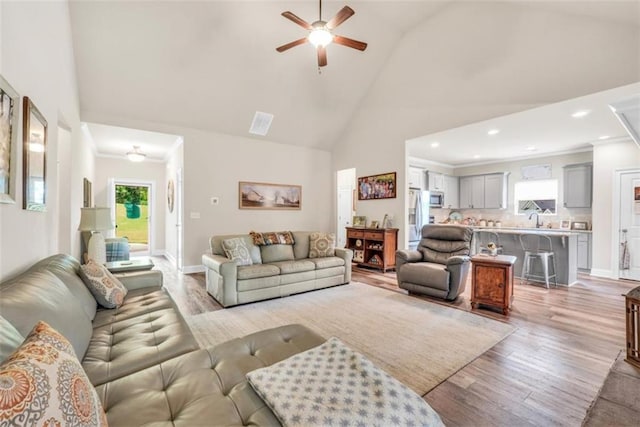 210 Riverpoint Way, Jackson, GA 30233 - living room with high vaulted ceiling, ceiling fan, light wood-style floors, and recessed lighting