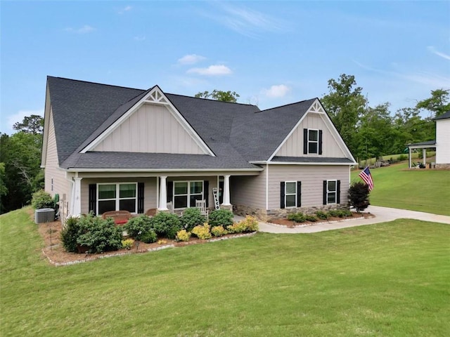 210 Riverpoint Way, Jackson, GA 30233 - view of front of house featuring board and batten siding, a front yard, a porch, and central AC unit