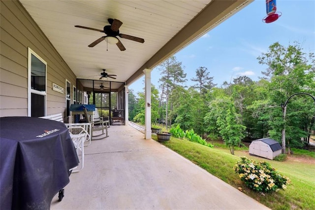 210 Riverpoint Way, Jackson, GA 30233 - view of patio / terrace with area for grilling, a ceiling fan, a storage unit, and an outbuilding