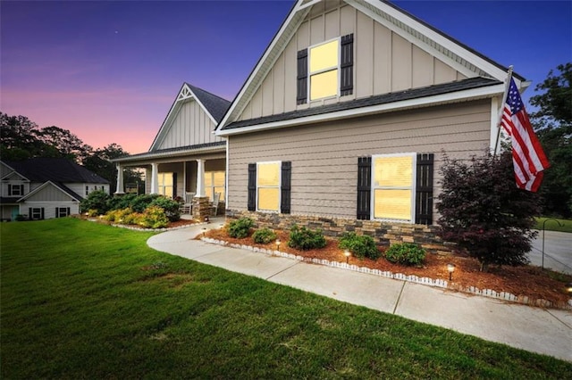 210 Riverpoint Way, Jackson, GA 30233 - craftsman inspired home with board and batten siding, a lawn, and a porch