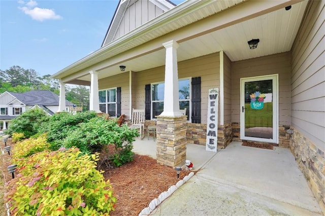 210 Riverpoint Way, Jackson, GA 30233 - view of exterior entry featuring board and batten siding and covered porch