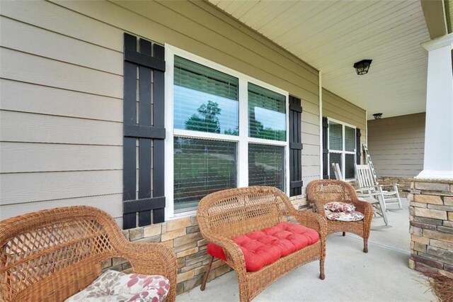 210 Riverpoint Way, Jackson, GA 30233 - view of patio / terrace with a porch