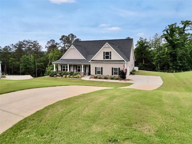 210 Riverpoint Way, Jackson, GA 30233 - view of front of home featuring board and batten siding, a front lawn, and driveway