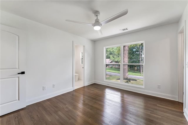 unfurnished room featuring dark hardwood / wood-style floors and ceiling fan