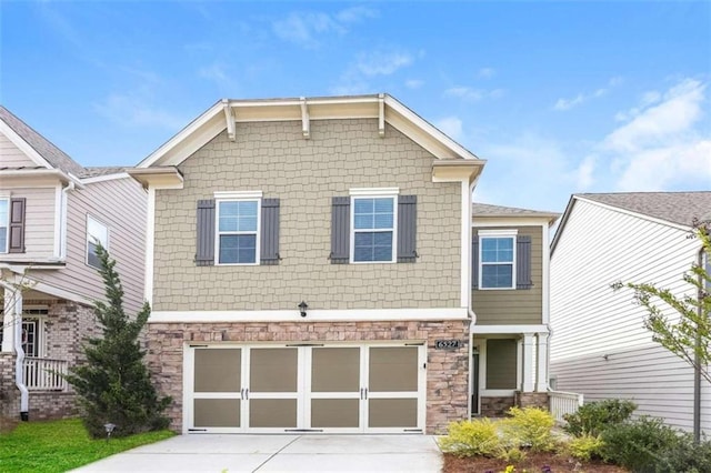 craftsman house with a garage