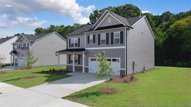 view of front of house featuring a garage and a front yard