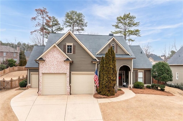 view of front of property with a garage