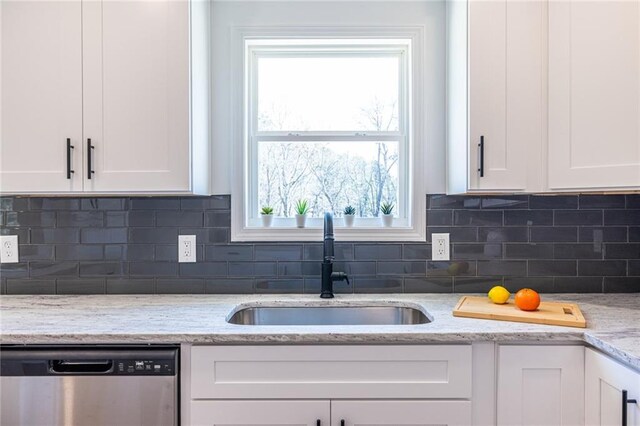 96 Sam Alexander Rd, Douglasville, GA 30134 - kitchen featuring decorative backsplash, white cabinets, a sink, and dishwasher