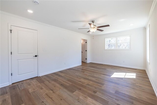 96 Sam Alexander Rd, Douglasville, GA 30134 - unfurnished room featuring crown molding, baseboards, wood finished floors, recessed lighting, and a ceiling fan