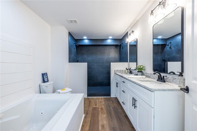 96 Sam Alexander Rd, Douglasville, GA 30134 - full bath with visible vents, a sink, walk in shower, and wood finished floors