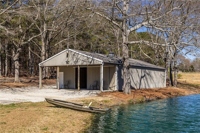 96 Sam Alexander Rd, Douglasville, GA 30134 - view of outbuilding featuring an outbuilding and a water view