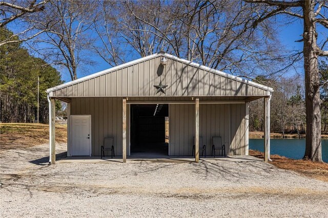 96 Sam Alexander Rd, Douglasville, GA 30134 - view of pole building with driveway and a water view