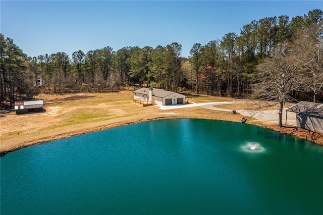 96 Sam Alexander Rd, Douglasville, GA 30134 - aerial view featuring a water view and a view of trees